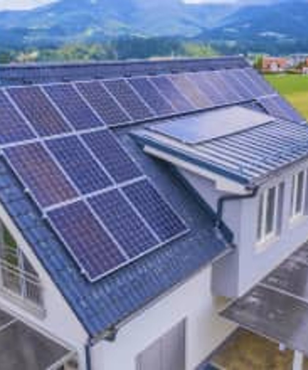 Aerial view of solar panels on shingle roof
